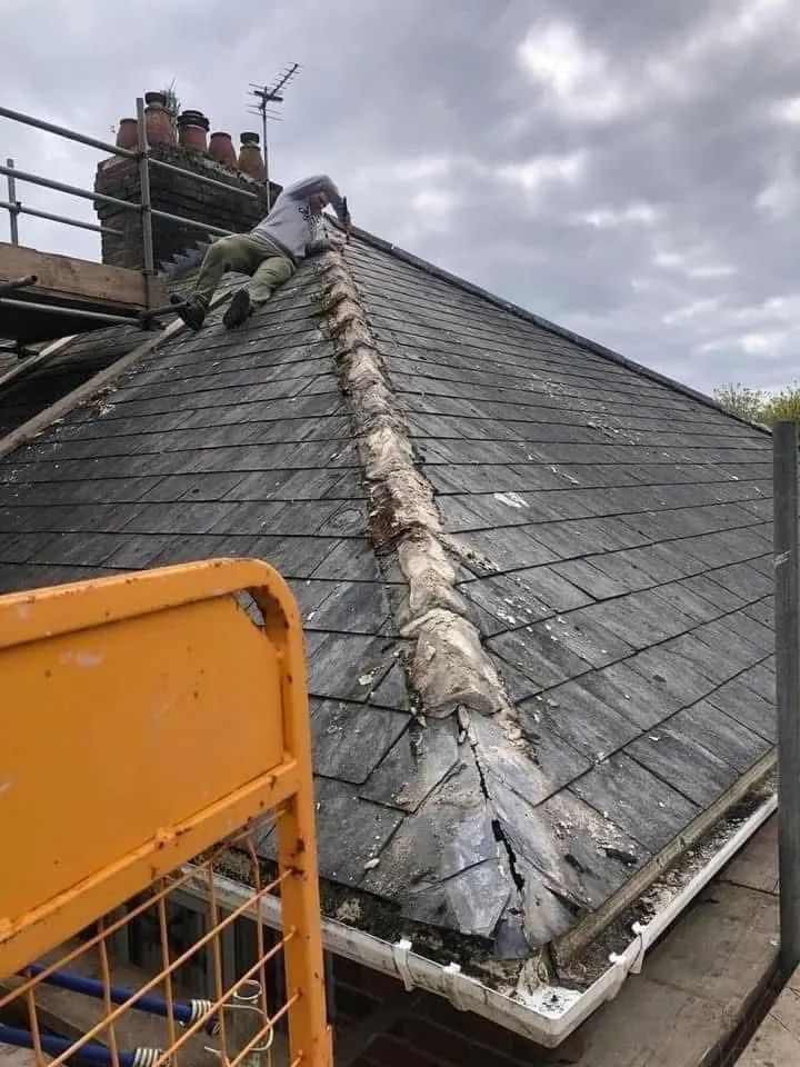 Slate roof ridge and chimney repair in Tintagel
